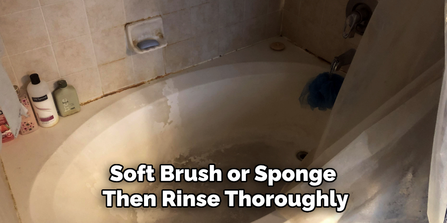 Soft Brush or Sponge 
Then Rinse Thoroughly