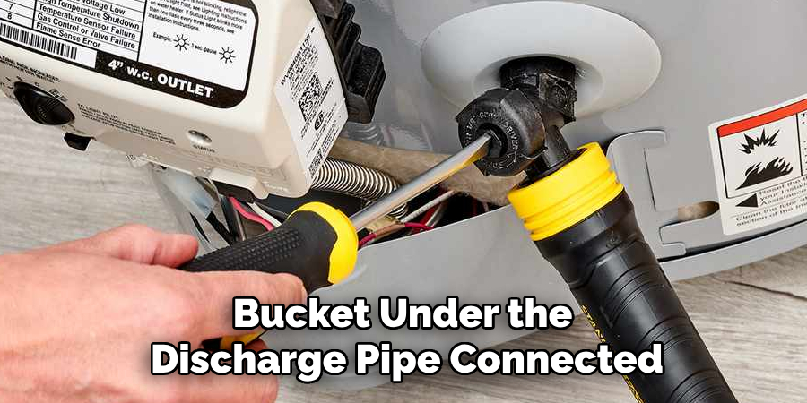 Bucket Under the
Discharge Pipe Connected