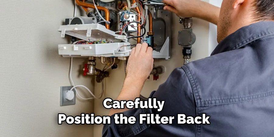 Carefully
Position the Filter Back