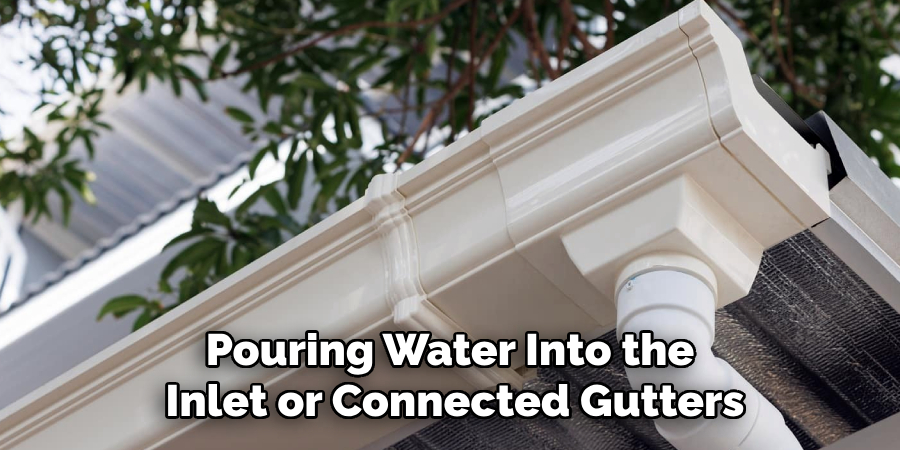 Pouring Water Into the 
Inlet or Connected Gutters