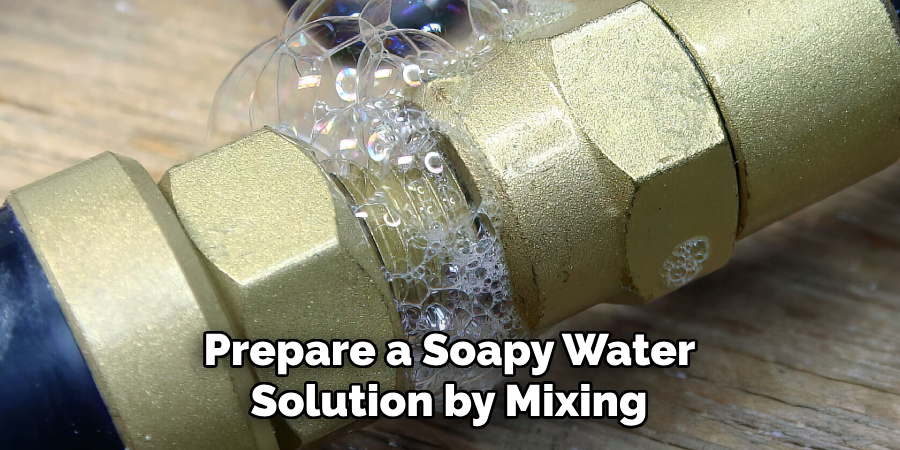 Prepare a Soapy Water 
Solution by Mixing 