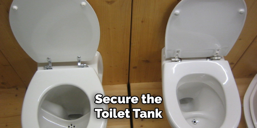 Secure the
Toilet Tank 