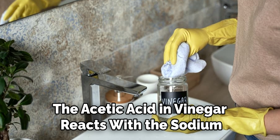 The Acetic Acid in Vinegar 
Reacts With the Sodium