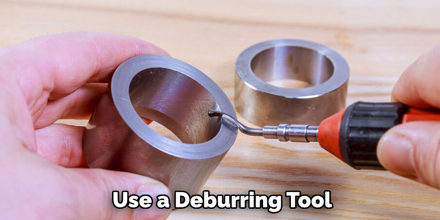 Use a Deburring Tool
