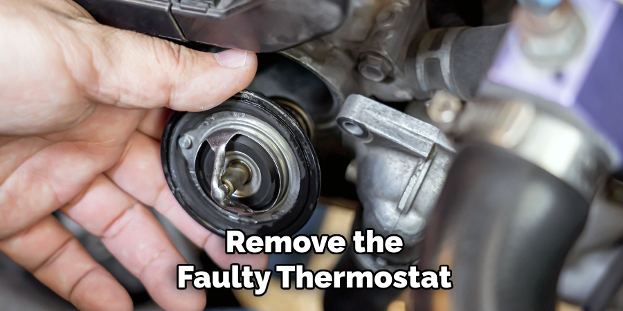 Remove the
Faulty Thermostat