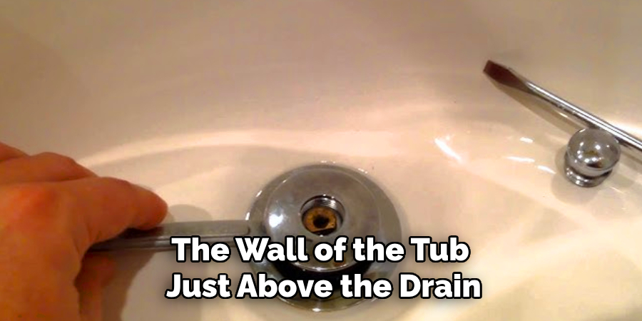The Wall of the Tub
Just Above the Drain