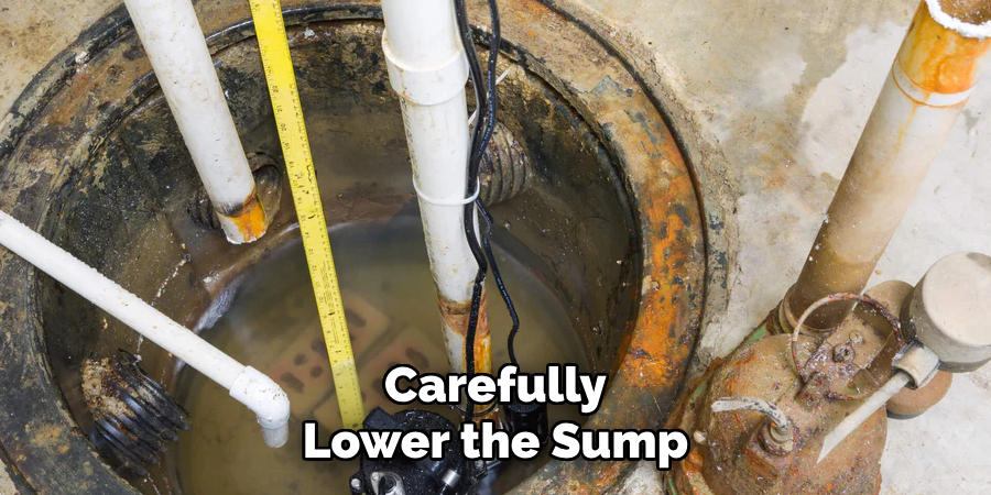 Carefully
Lower the Sump