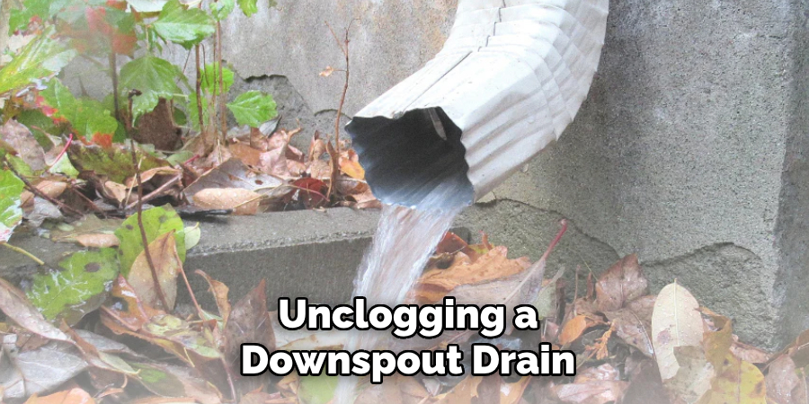 Unclogging a
Downspout Drain