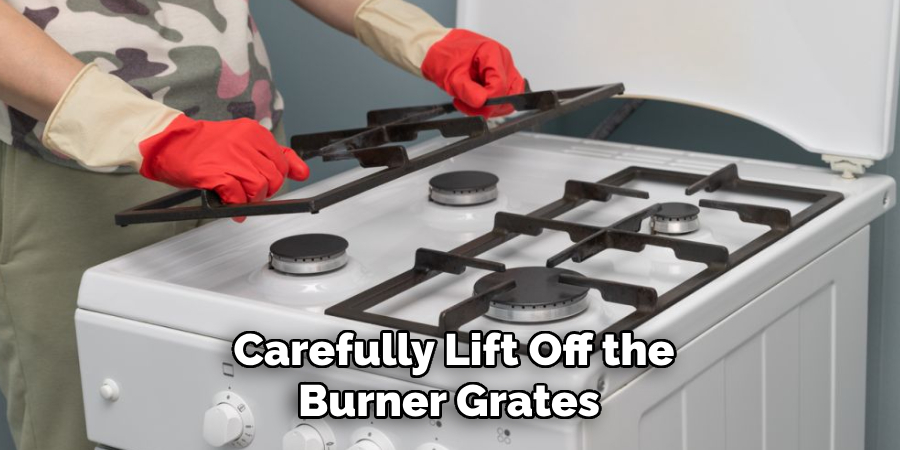 Carefully Lift Off the
Burner Grates