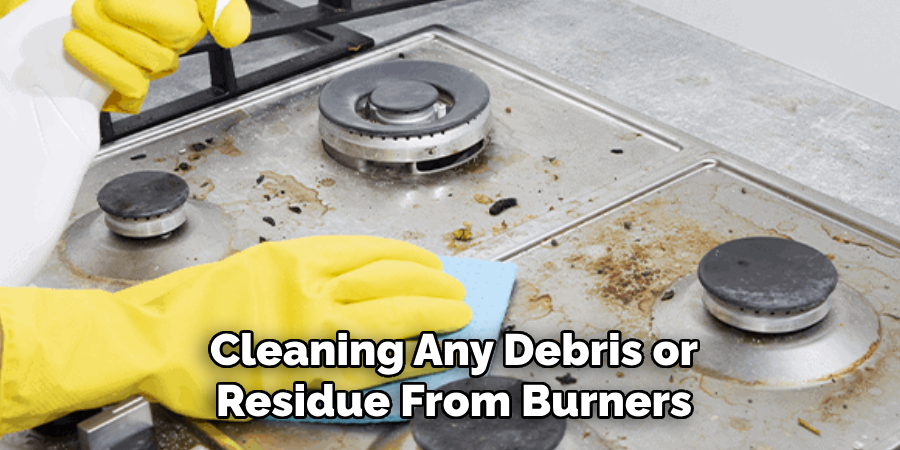 Cleaning Any Debris or
Residue From Burners