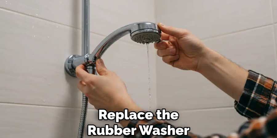 Replace the
Rubber Washer
