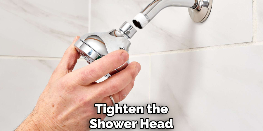 Tighten the
Shower Head